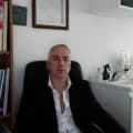 CLAUDIO PENNISI, Medico